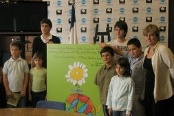 Participantes de años anteriores, con el cartel de esta edición./