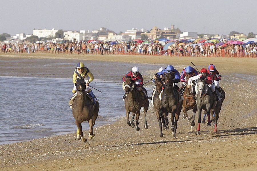 Carrera de caballos en la playa de Sanlúcar