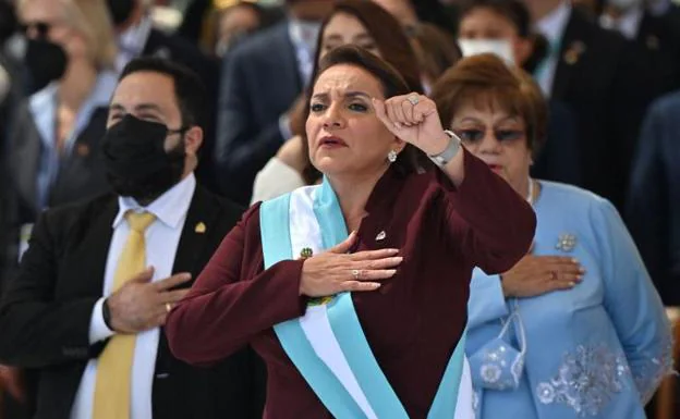 Xiomara Castro was sworn in with one hand on her heart.