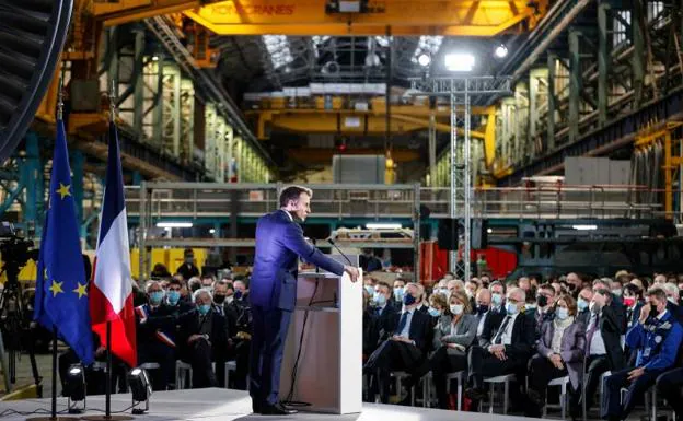 French President Emmanuel Macron makes a speech at the headquarters of the General Electric Steam Power company in Belfort.