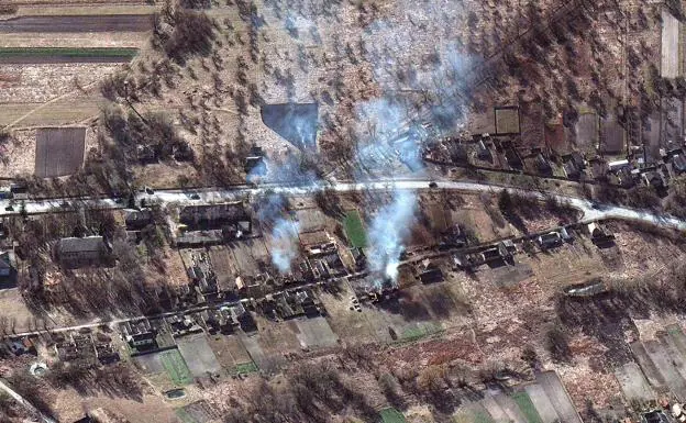 Satellite image showing several burned houses near Ivankiv, in Chernobyl