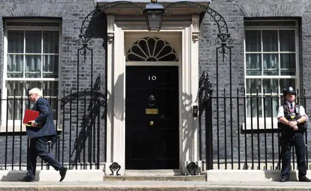 Boris Johnson leaves the British Government headquarters, in a file image. 