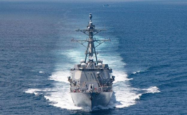 The USS Kidd guided-missile destroyer transits the Taiwan Strait.