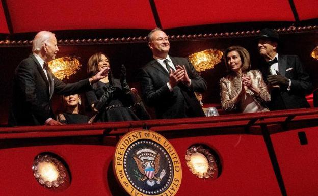 Paul Pelosi, right, wearing a hat and glove, joined his wife, Nancy, at an event in Washington.  Also pictured are Joe and Jill Biden (left), and Kamala Harris and her husband, Doug Emhoff (center).