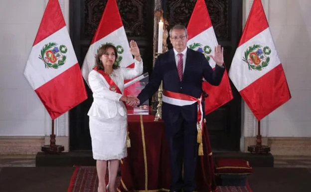 The president of Peru, Dina Boluarte, swears in her new prime minister, Pedro Angulo. 