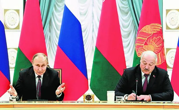 Putin and Lukashenko sat together at the table instead of facing each other, as is customary in bilateral state meetings. 